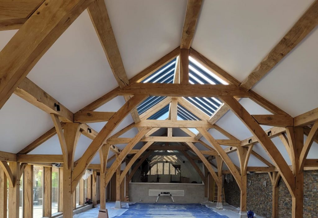 Oak framed swimming pool with white matt stretch ceiling Cawstone Sheffield